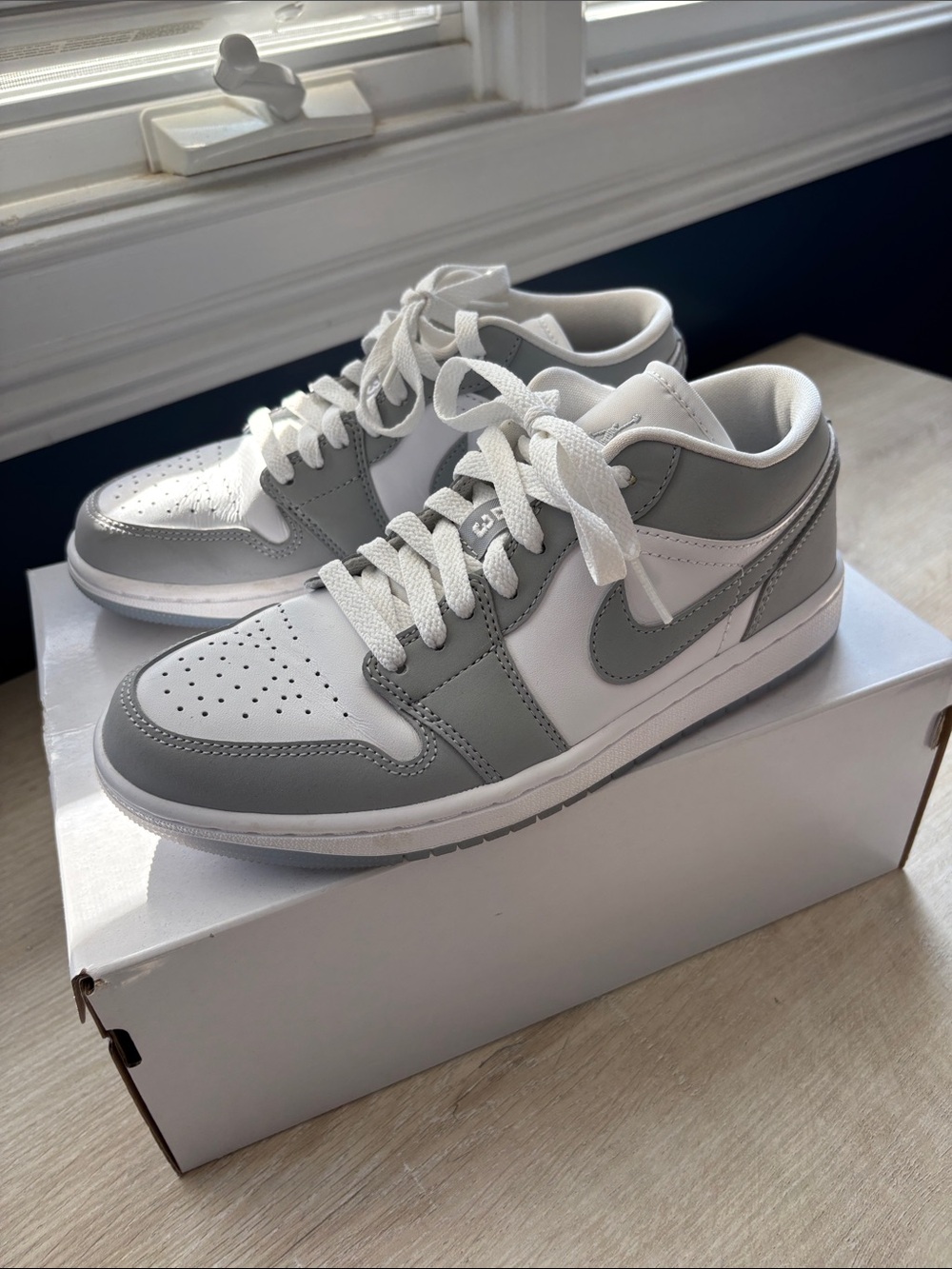 Air Jordan 1 Low-Top Sneakers in White and Light Gray. Woman’s size 6.5 (youth5)